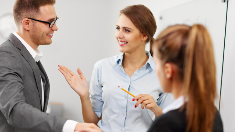 Businesspeople meeting in an office, symbolizing successful referral partnerships.