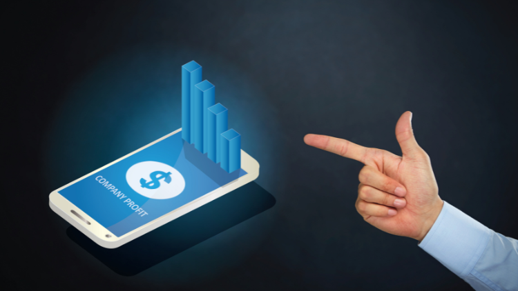 A smartphone screen displaying a rising profit chart with a hand pointing toward it.